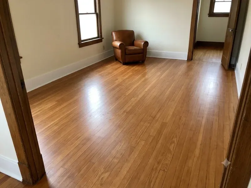 Refinished hardwood floor with a fresh satin finish in a Bakersfield bungalow